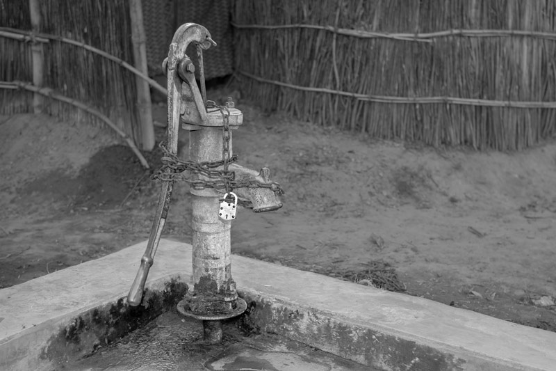 Impediments to enjoyment of Human Right to Water: 'Accessibility' Norm - public handpump appropriated and controlled by a powerful member of an upper caste in a village in Bhojpur district, Bihar